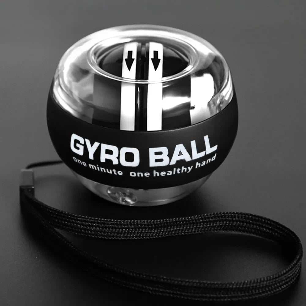 Self-starting wrist gyro ball power trainer for forearm and finger muscle strengthening