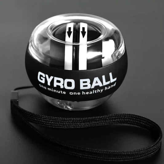 Self-starting wrist gyro ball power trainer for forearm and finger muscle strengthening